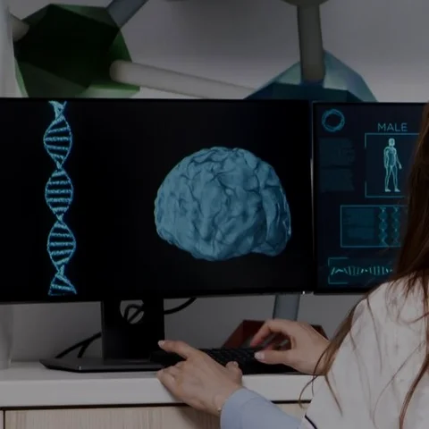 Fotografía de simulación de científicos revisando un estudio genético
